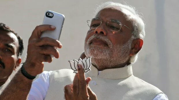 FIRs filed against Modi for flashing party Symbol after voting